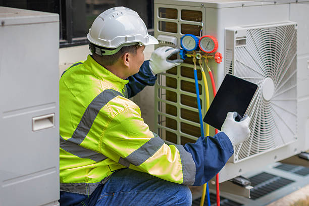 Professional Ac Installation technician working in North Uxbridge, MA